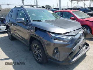 2023 Toyota RAV4 Hybrid XLE Premium with VIN JTMB6RFV5PD095138, listed as a IAAI auction lot 42562727 with 25,052 mi miles and . Bid and sale history available at DreamBid. Image 1.
