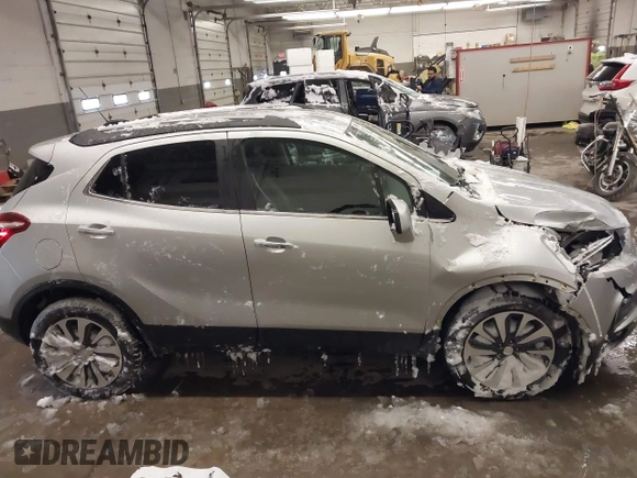 2021 Buick Encore Preferred with VIN KL4CJESB5MB308467, listed as a IAAI auction lot 41569987 with 52,199 mi miles. Bid and sale history available at carsss.com. Image 13.