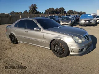 2005 Mercedes-Benz E-Class 5.5L AMG with VIN WDBUF76J15A768563, listed as a Copart auction lot 46345505 with 108,947 mi miles and Salvage Title. Bid and sale history available at carsss.com. Image 5.