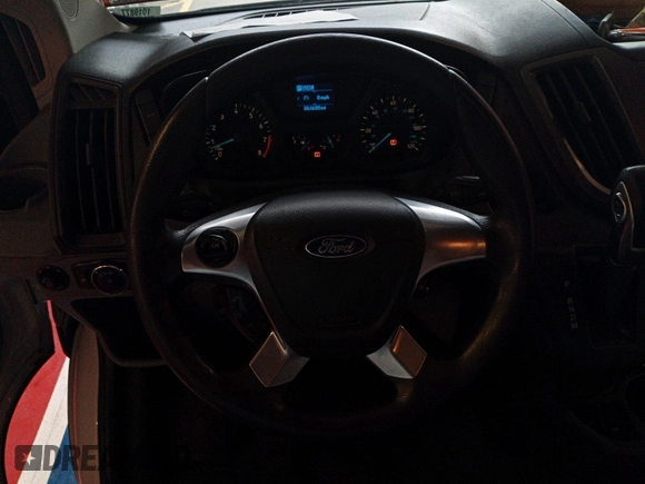 2016 Ford Transit Cargo z VIN 1FTYE1YM3GKB15532, wystawiony jako IAAI lot #42788480 z przebiegiem 64 600 mil mil oraz . Historia ofert i sprzedaży dostępna na DreamBid. Obrazek 21.