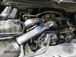 2003 Chevrolet Silverado 2500HD LT z VIN 1GCHK29103E114382, wystawiony jako Copart lot #85552984 z przebiegiem 289 539 mil mil oraz Czysty tytuł • Clean title. Historia ofert i sprzedaży dostępna na DreamBid. Obrazek 13.