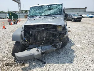 2013 Jeep Wrangler Sport with VIN 1C4AJWAG0DL696928, listed as a Copart auction lot 60822915 with 169,503 mi miles and Salvage title. Bid and sale history available at DreamBid. Image 5.