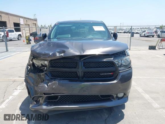 2013 Dodge Durango SXT with VIN 1C4RDHAG3DC694256, listed as a IAAI auction lot 42431904 with 152,321 mi miles and . Bid and sale history available at DreamBid. Image 12.