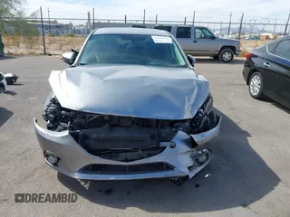 2015 Mazda 3 S Grand Touring with VIN JM1BM1M38F1256560, listed as a IAAI auction lot 41655332 with 121,179 mi miles and . Bid and sale history available at DreamBid. Image 13.