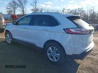 2019 Ford Edge SEL z VIN 2FMPK4J94KBB99418, wystawiony jako IAAI lot #41294393 z przebiegiem 57 706 mil mil oraz . Historia ofert i sprzedaży dostępna na DreamBid. Obrazek 3.