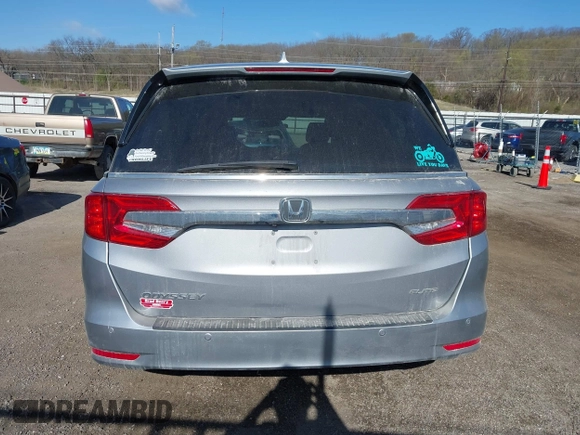 2018 Honda Odyssey Elite z VIN 5FNRL6H91JB070355, wystawiony jako IAAI lot #41975916 z przebiegiem 147 022 mil mil oraz . Historia ofert i sprzedaży dostępna na DreamBid. Obrazek 17.