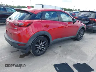 2018 Mazda CX-3 Touring with VIN JM1DKDC7XJ0318219, listed as a IAAI auction lot 41941104 with 86,186 mi miles. Bid and sale history available at carsss.com. Image 4.