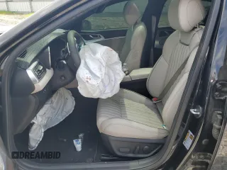 2023 Genesis G70 2.0T with VIN KMTG34TA2PU126768, listed as a Copart auction lot 56201094 with 11,556 mi miles and Salvage Title. Bid and sale history available at DreamBid. Image 7.