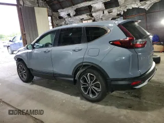 2020 Honda CR-V EX with VIN 2HKRW2H58LH642944, listed as a Copart auction lot 57077135 with 58,679 mi miles and Salvage title. Bid and sale history available at DreamBid. Image 2.