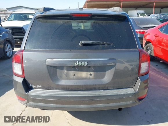 2015 Jeep Compass Sport with VIN 1C4NJCBBXFD274472, listed as a IAAI auction lot 41629585 with 124,407 mi miles. Bid and sale history available at carsss.com. Image 17.