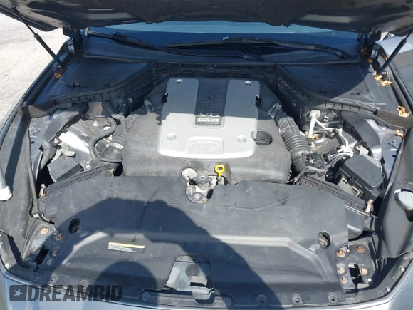 2015 Infiniti Q50 Premium z VIN JN1BV7AR3FM390743, wystawiony jako IAAI lot #41990093 z przebiegiem 91 350 mil mil oraz . Historia ofert i sprzedaży dostępna na DreamBid. Obrazek 10.