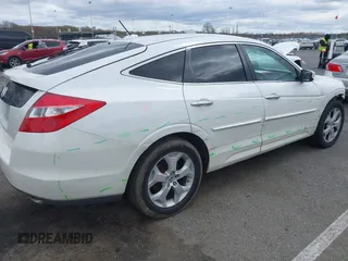 2010 Honda Crosstour EX-L z VIN 5J6TF2H57AL005231, wystawiony jako IAAI lot #42029109 z przebiegiem 134 451 mil mil oraz . Historia ofert i sprzedaży dostępna na DreamBid. Obrazek 4.