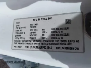 2022 Tesla Model 3 with VIN 5YJ3E1EA5NF124148, listed as a IAAI auction lot 41908884 with 45,115 mi miles. Bid and sale history available at carsss.com. Image 9.