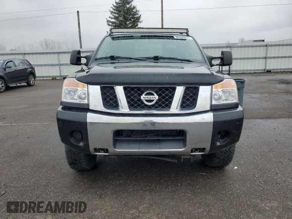 2014 Nissan Titan Pro-4X with VIN 1N6AA0EC3EN514744, listed as a Copart auction lot 80469314 with 191,780 mi miles and Salvage title. Bid and sale history available at DreamBid. Image 5.