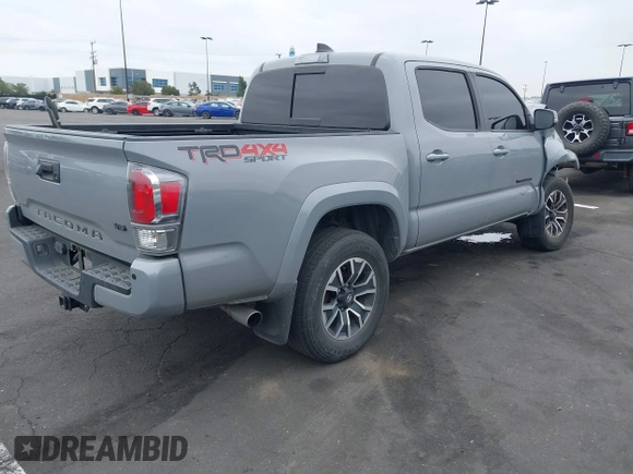 2021 Toyota Tacoma SR with VIN 3TMCZ5AN2MM405869, listed as a IAAI auction lot 42094533 with 78,449 mi miles and . Bid and sale history available at DreamBid. Image 4.