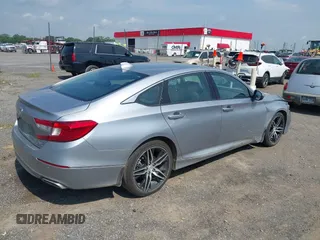 2021 Honda Accord Touring with VIN 1HGCV2F99MA014738, listed as a IAAI auction lot 42392129 with 25,802 mi miles and . Bid and sale history available at DreamBid. Image 4.