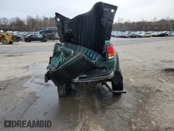 1999 Mazda B-Series Truck SE with VIN 4F4ZR17X2XTM25631, listed as a Copart auction lot 51625715 with 204,134 mi miles and Salvage Title. Bid and sale history available at DreamBid. Image 6.