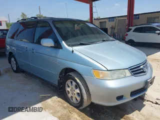 2003 Honda Odyssey EX with VIN 5FNRL18623B137962, listed as a IAAI auction lot 42155182 with 117,034 mi miles and . Bid and sale history available at carsss.com. Image 1.