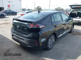 2021 Hyundai Ioniq SE with VIN KMHC65LD3MU249765, listed as a IAAI auction lot 41986977 with 63,363 mi miles and . Bid and sale history available at DreamBid. Image 4.