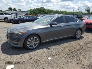 2018 Genesis G80 3.8L z VIN KMHGN4JE2JU253277, wystawiony jako Copart lot #65352795 z przebiegiem 127 802 mil mil oraz Czysty tytuł • Clean title. Historia ofert i sprzedaży dostępna na DreamBid. Obrazek 1.