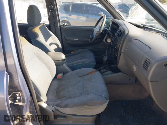 2001 Kia Sportage with VIN KNDJB723015065059, listed as a IAAI auction lot 41554856 with 170,827 mi miles. Bid and sale history available at carsss.com. Image 5.