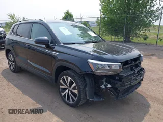 2024 Volkswagen Taos SE z VIN 3VVSX7B24RM007623, wystawiony jako IAAI lot #42383498 z przebiegiem 52 342 mil mil oraz . Historia ofert i sprzedaży dostępna na DreamBid. Obrazek 1.