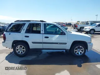 2004 Chevrolet TrailBlazer LT with VIN 1GNDS13S342361478, listed as a IAAI auction lot 42094261 with 298,130 mi miles and . Bid and sale history available at DreamBid. Image 13.