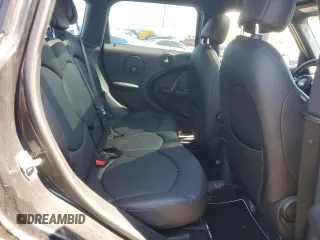 2013 MINI Countryman S ALL4 z VIN WMWZC5C54DWP34353, wystawiony jako Copart lot #57059295 z przebiegiem 154 012 mil mil oraz Szkoda całkowita • Salvage title. Historia ofert i sprzedaży dostępna na DreamBid. Obrazek 10.