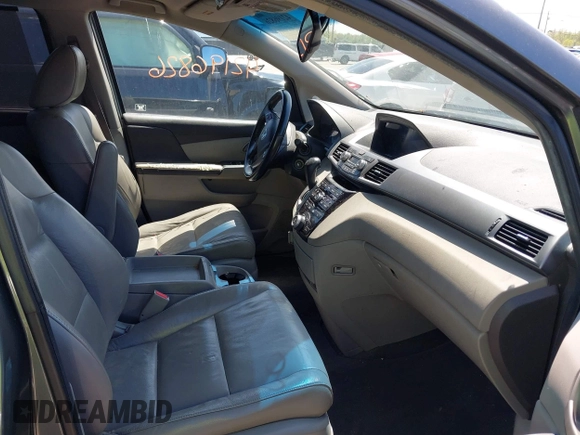2011 Honda Odyssey EX-L with VIN 5FNRL5H62BB071404, listed as a IAAI auction lot 42196826 with 278,657 mi miles and . Bid and sale history available at carsss.com. Image 5.