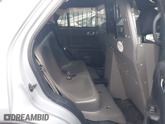 2018 Ford Police Interceptor Utility z VIN 1FM5K8ARXJGB59236, wystawiony jako IAAI lot #42076697 z przebiegiem Nie podano mil oraz . Historia ofert i sprzedaży dostępna na DreamBid. Obrazek 8.