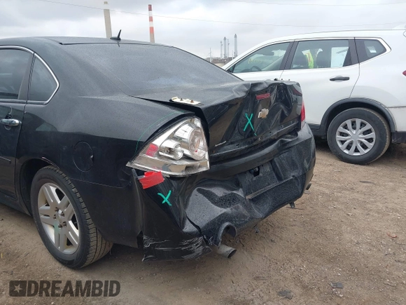 2014 Chevrolet Impala LT with VIN 2G1WB5E36E1150736, listed as a IAAI auction lot 41791685 with 128,779 mi miles and . Bid and sale history available at DreamBid. Image 6.