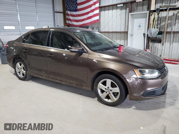 2014 Volkswagen Jetta TDI w/Premium/Nav with VIN 3VWLL7AJ3EM352687, listed as a Copart auction lot 63249725 with 122,678 mi miles and Clean title. Bid and sale history available at DreamBid. Image 4.