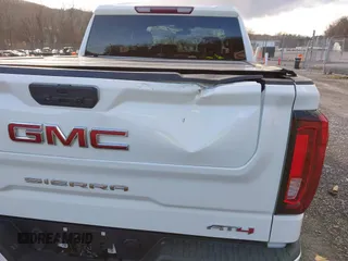 2021 GMC Sierra 1500 AT4 with VIN 3GTP9EEL1MG405564, listed as a IAAI auction lot 41214073 with 49,114 mi miles. Bid and sale history available at carsss.com. Image 18.