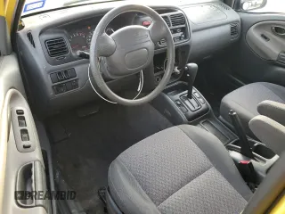 2003 Chevrolet Tracker z VIN 2CNBE18C136928311, wystawiony jako Copart lot #84463154 z przebiegiem 118 195 mil mil oraz Szkoda całkowita • Salvage title. Historia ofert i sprzedaży dostępna na DreamBid. Obrazek 8.