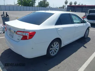 2012 Toyota Camry XLE z VIN 4T1BD1FK0CU007194, wystawiony jako IAAI lot #42281914 z przebiegiem 186 379 mil mil oraz . Historia ofert i sprzedaży dostępna na DreamBid. Obrazek 4.