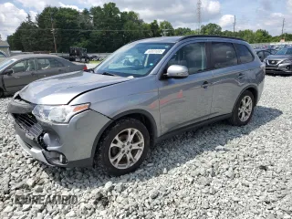 2015 Mitsubishi Outlander SE with VIN JA4AD3A36FZ002031, listed as a Copart auction lot 60831095 with 156,794 mi miles and Salvage title. Bid and sale history available at DreamBid. Image 1.