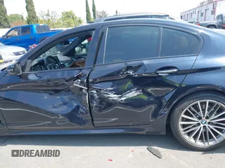 2018 BMW 5 Series 530i with VIN WBAJA5C51JG898278, listed as a IAAI auction lot 42595701 with 96,777 mi miles and . Bid and sale history available at DreamBid. Image 14.