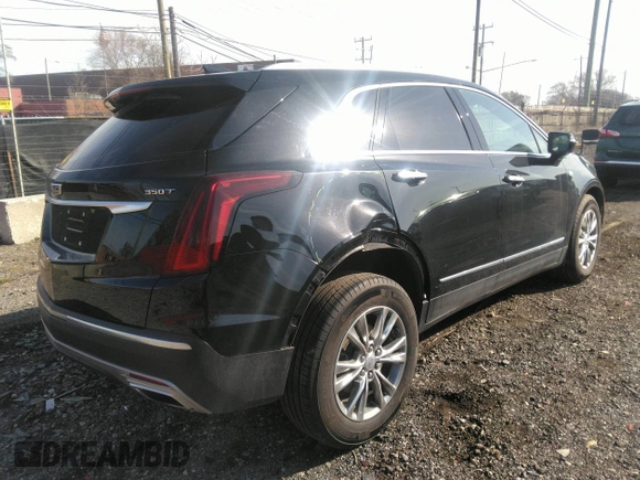 2022 Cadillac XT5 AWD Premium Luxury with VIN 1GYKNDR4XNZ164098, listed as a IAAI auction lot 41822372 with 32,644 mi miles and . Bid and sale history available at DreamBid. Image 4.