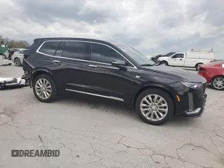 2021 Cadillac XT6 Premium Luxury z VIN 1GYKPCRS1MZ169952, wystawiony jako Copart lot #51908895 z przebiegiem 31 834 mil mil oraz Szkody całkowita. Historia ofert i sprzedaży dostępna na DreamBid. Obrazek 4.