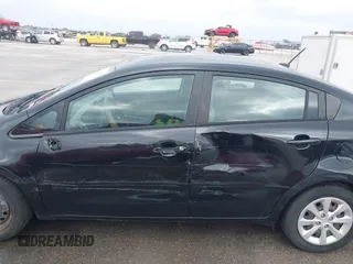 2015 Kia Rio LX with VIN KNADM4A39F6440291, listed as a IAAI auction lot 41532881 with 97,238 mi miles. Bid and sale history available at carsss.com. Image 6.