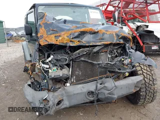 2011 Jeep Wrangler Unlimited Sport with VIN 1J4BA3H17BL552319, listed as a IAAI auction lot 41747031 with 120,751 mi miles. Bid and sale history available at carsss.com. Image 6.