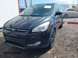 2015 Ford Escape SE z VIN 1FMCU0G73FUA15318, wystawiony jako IAAI lot #41797483 z przebiegiem 85 736 mil mil oraz . Historia ofert i sprzedaży dostępna na DreamBid. Obrazek 2.