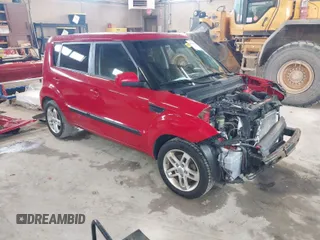 2011 Kia Soul + with VIN KNDJT2A23B7329051, listed as a IAAI auction lot 41963566 with 146,063 mi miles. Bid and sale history available at carsss.com. Image 1.