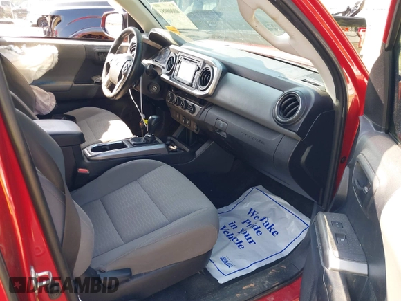 2018 Toyota Tacoma SR with VIN 5TFCZ5AN7JX163344, listed as a IAAI auction lot 40008984 with 93,598 mi miles. Bid and sale history available at carsss.com. Image 5.
