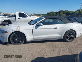 2019 Ford Mustang EcoBoost z VIN 1FATP8UH8K5162526, wystawiony jako IAAI lot #41846704 z przebiegiem 84 527 mil mil oraz . Historia ofert i sprzedaży dostępna na DreamBid. Obrazek 15.