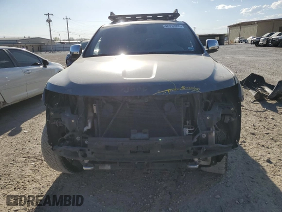 2015 Jeep Grand Cherokee Overland with VIN 1C4RJFCT2FC628727, listed as a Copart auction lot 48972095 with 155,435 mi miles and Salvage Title. Bid and sale history available at carsss.com. Image 5.