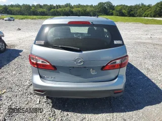 2013 Mazda 5 Sport z VIN JM1CW2BLXD0148001, wystawiony jako Copart lot #63296815 z przebiegiem 162 513 mil mil oraz Szkoda całkowita • Salvage title. Historia ofert i sprzedaży dostępna na DreamBid. Obrazek 6.