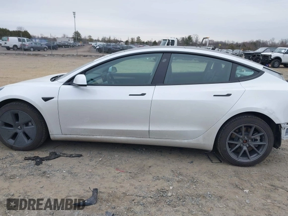 2021 Tesla Model 3 Long Range with VIN 5YJ3E1EB8MF019367, listed as a IAAI auction lot 41506094 with 14,257 mi miles and . Bid and sale history available at DreamBid. Image 15.