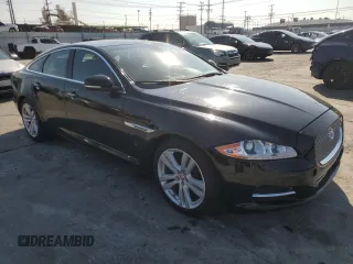 2011 Jaguar XJ with VIN SAJWA1CB4BLV05830, listed as a Copart auction lot 43007345 with 72,933 mi miles and Salvage title. Bid and sale history available at DreamBid. Image 4.