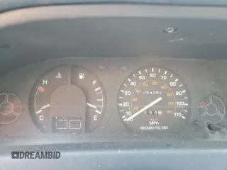 1990 Toyota Corolla z VIN JT2AE94A5L3323663, wystawiony jako Copart lot #71963834 z przebiegiem 354 386 mil mil oraz Szkoda całkowita • Salvage title. Historia ofert i sprzedaży dostępna na DreamBid. Obrazek 9.